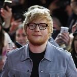 FILE - In this Friday, Feb. 23, 2018 file photo, singer-songwriter Ed Sheeran, center, arrives for the screening of the film 'Songwriter' during the 68th edition of the International Film Festival Berlin, Berlinale, in Berlin, Germany. Ed Sheeran and his wife Cherry have announced the birth of their daughter Lyra Antarctica Seaborn Sheeran. The singer-songwriter said in an Instagram post that the coupleâ€™s â€œbeautiful and healthy daughterâ€ was born last week. (AP Photo/Markus Schreiber, File)