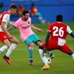 Los jugadores del Girona en un partido frente al Barcelona.