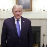 El presidente Donald Trump, justo antes de ser ingresado