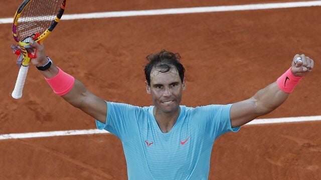 Spain's Rafael Nadal celebrates winning the semifinal match of the French Open tennis tournament against Argentina's Diego Schwartzman in three sets, 6-3, 6-3, 7-6, at the Roland Garros stadium in Paris, France, Friday, Oct. 9, 2020. (AP Photo/Alessandra Tarantino)