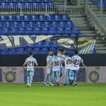 Los jugadores del Málaga celebran un gol.