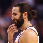 Nov 4, 2019; Phoenix, AZ, USA; Phoenix Suns foreword Kelly Oubre Jr. (left) celebrates with guard Ricky Rubio against the Philadelphia 76ers in the closing seconds of the game at Talking Stick Resort Arena. Mandatory Credit: Mark J. Rebilas-USA TODAY Sports