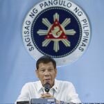In this photo provided by the Malacanang Presidential Photographers Division, Philippine President Rodrigo Duterte gestures as he meets members of the Inter-Agency Task Force on the Emerging Infectious Diseases at the Malacanang presidential palace in Manila, Philippines on Monday Dec. 7, 2020. The Philippine president has ruled out any ceasefire and a resumption of long-stalled peace talks with communist guerrillas and renewed a vow to destroy the insurgents in his last two years in office. (King Rodriguez/Malacanang Presidential Photographers Division via AP)