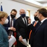 La canciller alemana, Angela Merkel, y el presidente francés, Emmanuel Macron, en primer término, durante una de las cumbres sobre el Fondo de Recuperación de la UE