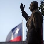 FILE - In this Jan. 30, 2019 file photo, a statue of the late President Eduardo Frei Montalva stands in front of the La Moneda Palace, in Santiago, Chile. A court in Santiago has revoked on Monday, Jan. 25, 2021, a ruling that found 4 doctors and two former security agents of the regime of dictator Augusto Pinochet guilty for the murder of former president Frei in 1982. (AP Photo/Luis Hidalgo, File)