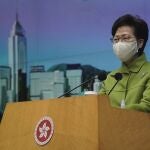 FILE - In this Jan. 26, 2021, file photo, Hong Kong Chief Executive Carrie Lam listens to reporters' questions during a press conference in Hong Kong. Hong Kong leader Carrie Lam said Tuesday, Feb. 23, that it was â€œcrystal clearâ€ that electoral reform is necessary, a day after a top Beijing official signaled major changes would be coming to ensure the semi-autonomous city is run by â€œpatriots. (AP Photo/Vincent Yu, File)