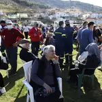 Local residents gather at a soccer field after an earthquake in Mesochori village, central Greece, Wednesday, March 3, 2021. An earthquake with a preliminary magnitude of up to 6.3 struck central Greece on Wednesday and was felt as far away as the capitals of neighboring Albania, North Macedonia, Kosovo and Montenegro. (AP Photo/Vaggelis Kousioras)