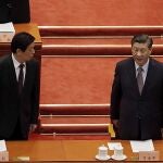 Chinese President Xi Jinping, right, chats with Li Zhanshu, Chairman of National People's Congress, as they arrive for the opening session of Chinese People's Political Consultative Conference (CPPCC) at the Great Hall of the People in Beijing, Thursday, March 4, 2021. (AP Photo/Andy Wong)