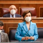 La vicepresidenta primera del Gobierno y ministra de Presidencia, Relaciones con las Cortes y Memoria Democrática, Carmen Calvo, interviene en una sesión de control en el Congreso de los Diputados, a 12 de mayo de 2021, en Madrid, (España)