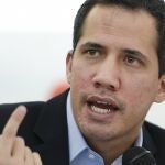 FILE - In this March 3, 2021 file photo, opposition leader Juan Guaido speaks at a press conference in the Los Palos Grandes neighborhood of Caracas, Venezuela. Guaido on Tuesday, May 11, 2021, proposed negotiations with the government of President Nicolas Maduro to open up the country to a possible recovery from a complex crisis. (AP Photo/Matias Delacroix, File)