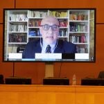 FILE - In this Feb. 12, 2021, file photo, Thomas Andrews, UN Special Rapporteur on the human rights situation in Myanmar is displayed on a screen as he addresses his statement during the Human Rights Council special session on "the human rights implications of the crisis in Myanmar" at the European headquarters of the United Nations in Geneva, Switzerland. At least one-quarter of the people in Myanmar's smallest state have been forced to flee their homes because of combat with the military junta that seized power in February, raising fears of a possible humanitarian tragedy including thousands of civilian deaths, the U.N. expert Andrews said Wednesday, June 9.(Salvatore Di Nolfi/Keystone via AP, File)