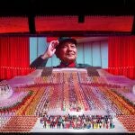 A screen shows late Chinese leader Deng Xiaoping during a show commemorating the 100th anniversary of the founding of the Communist Party of China at the National Stadium in Beijing, China June 28, 2021. REUTERS/Thomas Peter