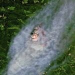 This satellite image provided by European Union, Copernicus Sentinel-2 data (processed by Spacetec) shows a wildfire burning 40 km (about 25 miles) northeast of Pink Mountain in British Columbia. (European Union, Copernicus Sentinel-2 data via AP)