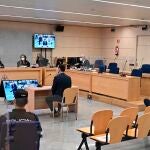Los dos mossos que acompañaban a Puigdemont al ser detenidos, en un momento del juicio que se celebra en la Audiencia Nacional