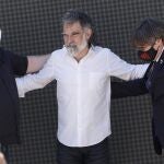 GRAFCAT6366 Elna (FRANCIA) 16/7/2021.- La plana mayor del independentismo, con el líder de ERC, Oriol Junqueras (i) y el presidente de JxCat, Carles Puigdemont (d), y el presidente de Omniun Cultural, Jordi Cuixart (c), a la cabeza, asistieron este mediodía al acto de conmemoración del 60 aniversario de Òmnium Cultural en la población de Elna (Francia). EFE/Quique Garcia