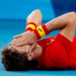 Pablo Carreño se lleva las manos a la cara después del último punto ante Djokovic