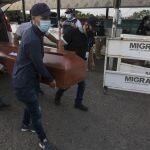 Venezuelans return to their country with the remains of a relative who died in Colombia, through the Simon Bolivar International Bridge as they leave La Parada near Cucuta, Colombia,Â Colombia, Tuesday, Oct. 5, 2021. Venezuela partially reopened its border with Colombia after closing it in 2019, a nearly three-year closure, due to political tensions. (AP Photo/Ivan Valencia)