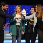 Candidates for deputies for the City of Buenos Aires, from right, MarÃ­a Eugenia Vidal, from "Juntos por el Cambio" party, Javier Milei from " Libertad Avanza" party, Myriam Bregman from "Frente de Izquierda" party and Leandro Santoro, from "Frente de Todos" party, pose for a picture before a debate prior to legislative elections in Buenos Aires, Argentina, Wednesday, Oct. 13, 2021. Legislative elections are scheduled for Nov. 14, 2021. (AP Photo/Natacha Pisarenko)