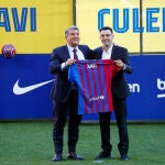 Joan Laporta y Xavi, durante la presentación del nuevo entrenador
