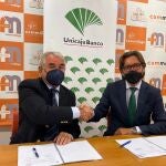 Firma del convenio entre Unicaja Banco y Commálaga