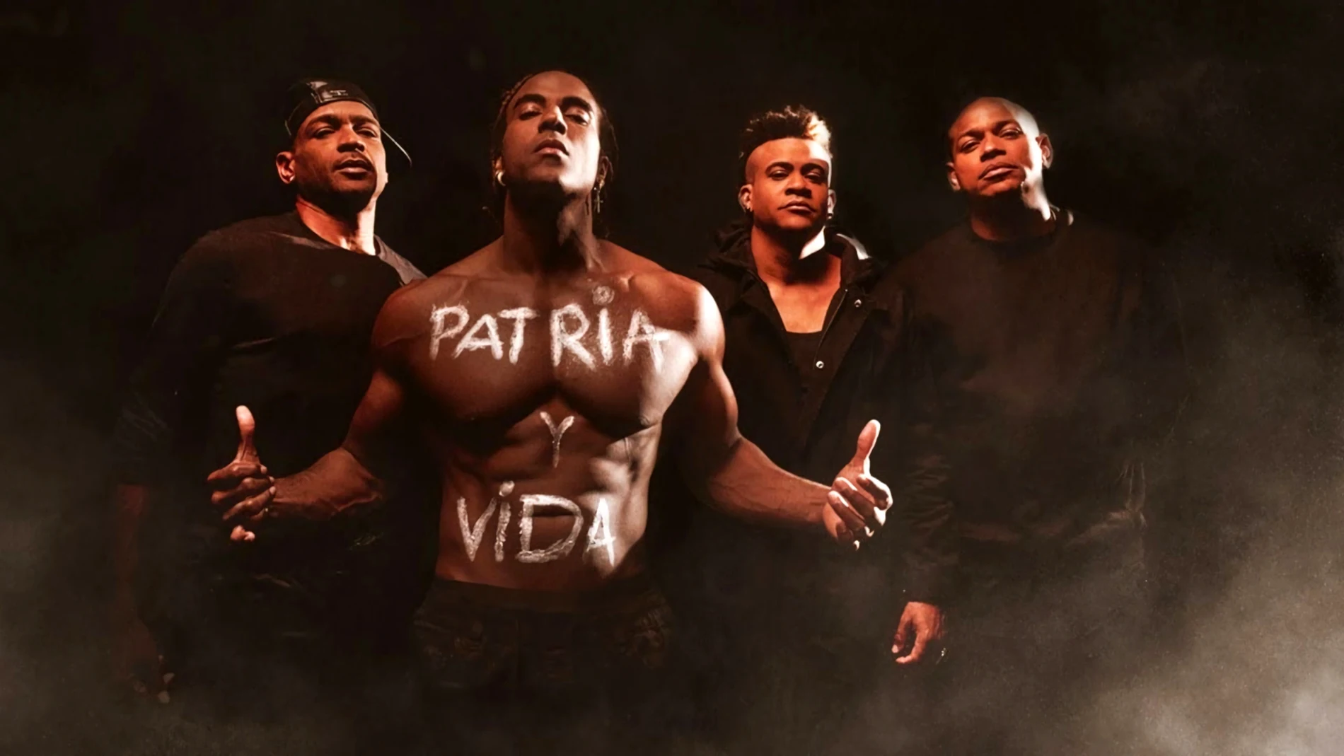Captura de vídeo donde aparecen los cantantes cubanos (i-d) El Funky, Yotuel y Randy Malcom y Alexander Delgado del dúo Gente de Zona durante un momento del vídeo musical "Patria y vida" en el que participa Maikel Osorbo