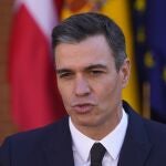 Spain's Premier Pedro Sanchez speaks during a joint news conference with Denmark's Prime Minister Mette Frederiksen at the Moncloa Palace in Madrid, Spain, Monday, Feb. 21, 2022. (AP Photo/Paul White)