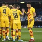 Los jugadores del Barcelona celebran uno de sus tres goles