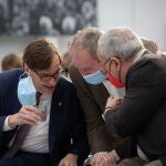 El primer secretario del PSC, Salvador Illa, el exalcalde de Barcelona, Jordi Hereu, y el presidente del Comité Olímpico Español, Alejandro Blanco