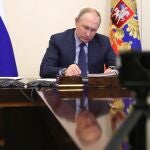 FILE - Russian President Vladimir Putin attends a meeting via videoconference in Moscow, Russia, March 25, 2022. (Mikhail Klimentyev/Sputnik, Kremlin Pool Photo via AP, File)