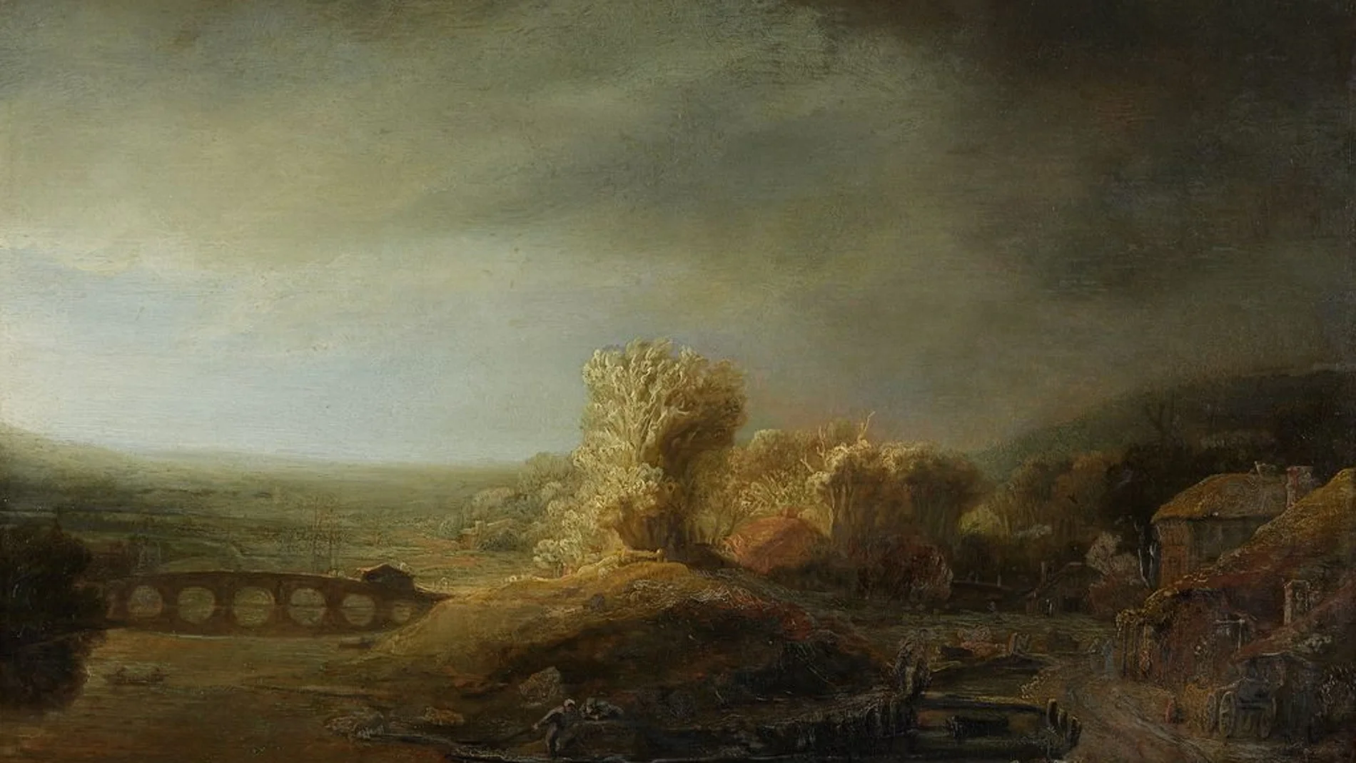 Paisaje con puente arqueado por Rembrandt