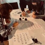 Taller de caligrafía en la Villa Romana de La Olmeda, en Palencia