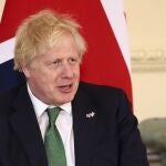 Britain's Prime Minister Boris Johnson talks with President of Uruguay Luis Lacalle Pou at 10 Downing Street, London, Monday May 23, 2022. (Henry Nicholls/Pool via AP)