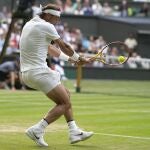 Spain's Rafael Nadal returns the ball to Italy's Lorenzo Sonego during a third round men's singles match on day six of the Wimbledon tennis championships in London, Saturday, July 2, 2022. (AP Photo/Alastair Grant)