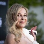 Ana Obregón presenta a su nieta con vestido de Charo Ruiz. 