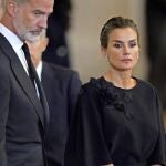 King Felipe VI and Queen Letizia of Spain look at the coffin of Queen Elizabeth II as it lies in state on the catafalque in Westminster Hall, in London, Sunday, Sept. 18, 2022. ( Jacob King/Pool Photo via AP)