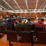 Algunos de los diez acusados durante un juicio contra diez personas acusadas de pagar por tener sexo con menores tutelados