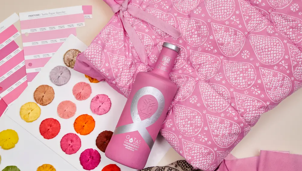 Botella de agua solidaria y bolso diseñador por Martina Klein