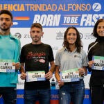 Los corredores de élite nacional, Fernando Carro (i), Juan Antonio "Chiki" Pérez, Laura Méndez y Marta Galimany (d), durante la rueda de prensa ofrecida este viernes con motivo de la trigésimo primera edición del Medio Maratón Valencia, que se celebra este domingo con 20.000 corredores populares y un centenar de categoría Élite