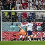 England's Harry Kane, left, fails a penalty kick during the World Cup quarterfinal soccer match between England and France, at the Al Bayt Stadium in Al Khor, Qatar, Saturday, Dec. 10, 2022. (AP Photo/Christophe Ena)