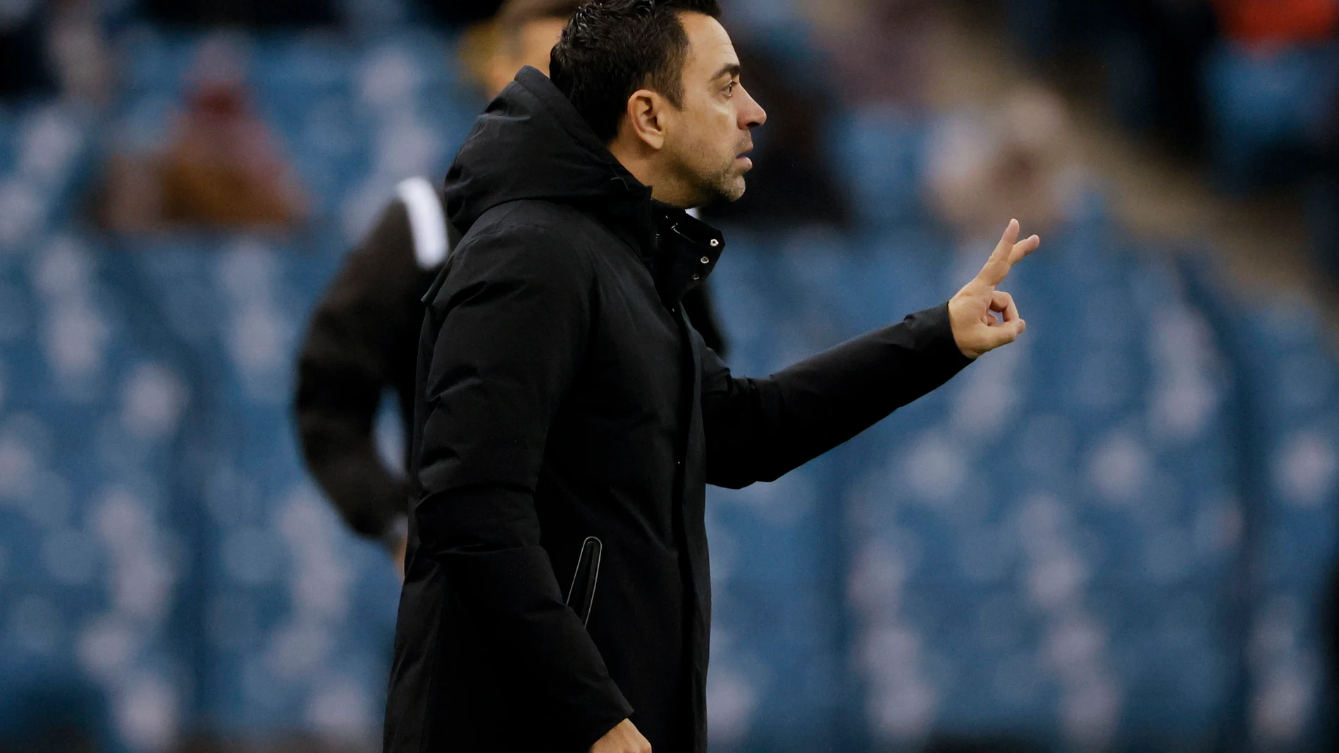 El entrenador del FC Barcelona Xavi Hernández en el partido de semifinales de la Supercopa de España que enfrenta al Real Betis y al FC Barcelona y que se disputa este jueves en el Estadio Internacional Rey Fahd, en Riad, Arabia Saudí