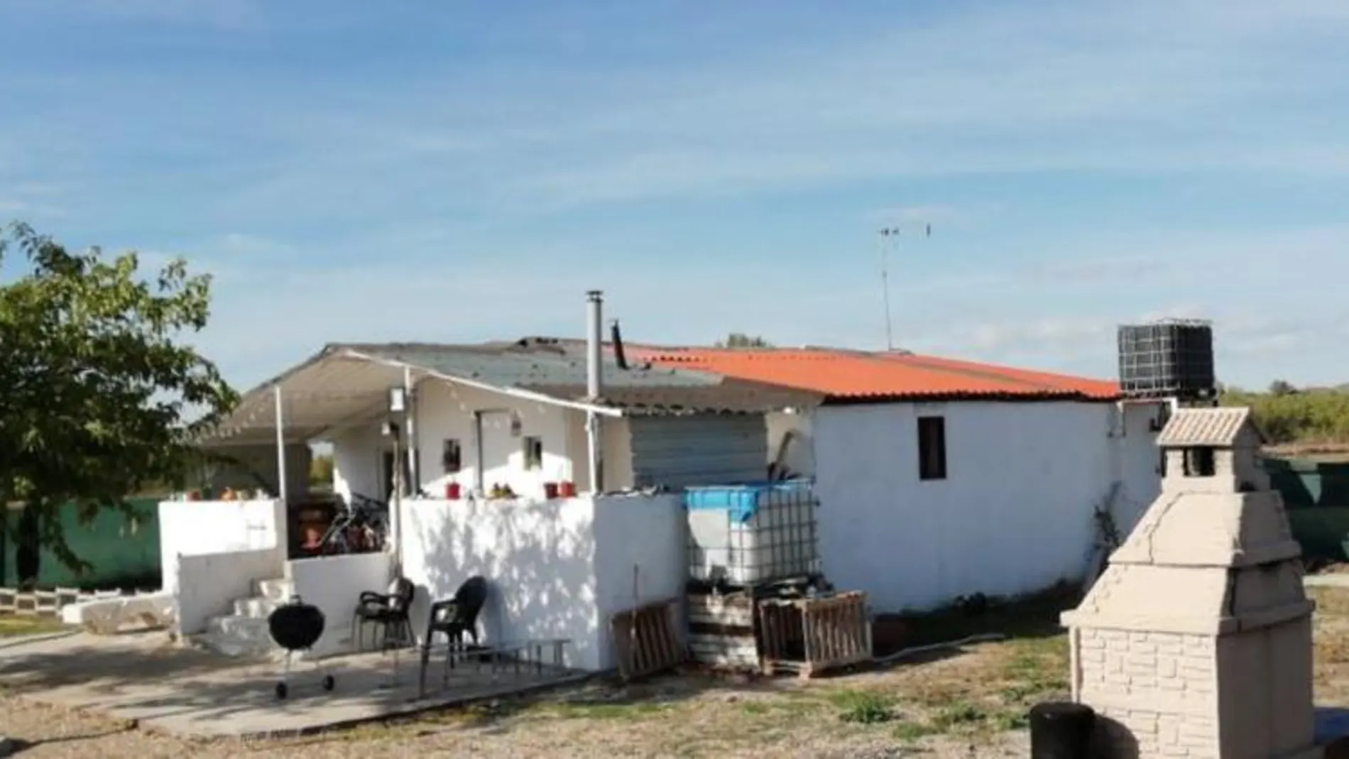 Imagen de la vivienda, antes de su derribo