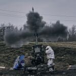 Ukrainian soldiers fire a self-propelled howitzer towards Russian positions near Bakhmut, the site of the heaviest battles, Donetsk region, Ukraine, Tuesday, March 7, 2023.
