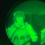 This screen grab taken from an undated video posted on Telegram channel @concordgroup_official on April 3, 2023 shows Yevgeny Prigozhin, head of Russia's Wagner paramilitary group, holding a Russian flag in an undisclosed location. - Russia's Wagner paramilitary group on Monday claimed it had captured the city hall in Ukraine's eastern town of Bakhmut, giving it "legal" control, but Kyiv said its forces still held the town. Wagner head Prigozhin posted a video on his Telegram channel showing him holding a Russian flag, which he said his forces would plant on Bakhmut's city hall.