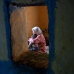 Hayat (L), grand mother of tenage girl Sana sits with her great grandson in their home in the outskirts of the city of Tiflet, Northwestern Morocco, 04 April 2023. (Issued 12 April 2023) Sana, who is now thirteen, was raped when she was 11 year old by three men and became pregnant with a boy. Overcoming fears of reprisal as the rapists live near her house, the father lodged a complaint against them, and the court sentenced them on 06 April to a year and a half and two years in prison. The length of the sentences raised indignation as the Moroccan law normally stipulates five to ten years prison term which can go up to twenty if the victim is a minor. According to a study prepared in 2020 by the femminist group Masaktach (I won't keep quiet in Arabic), analyzing 1,169 cases from the 21 First Istance Courts in Morocco: 80 per cent of those convicted of rape receive a sentence of less than five years and in practice they are in prison for an average of three years and one month. (Marruecos) 