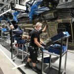 Workers assemble the new Mercedes S-class during a press event for the opening of the Factory 56 production slated line in Sindelfingen, Germany.