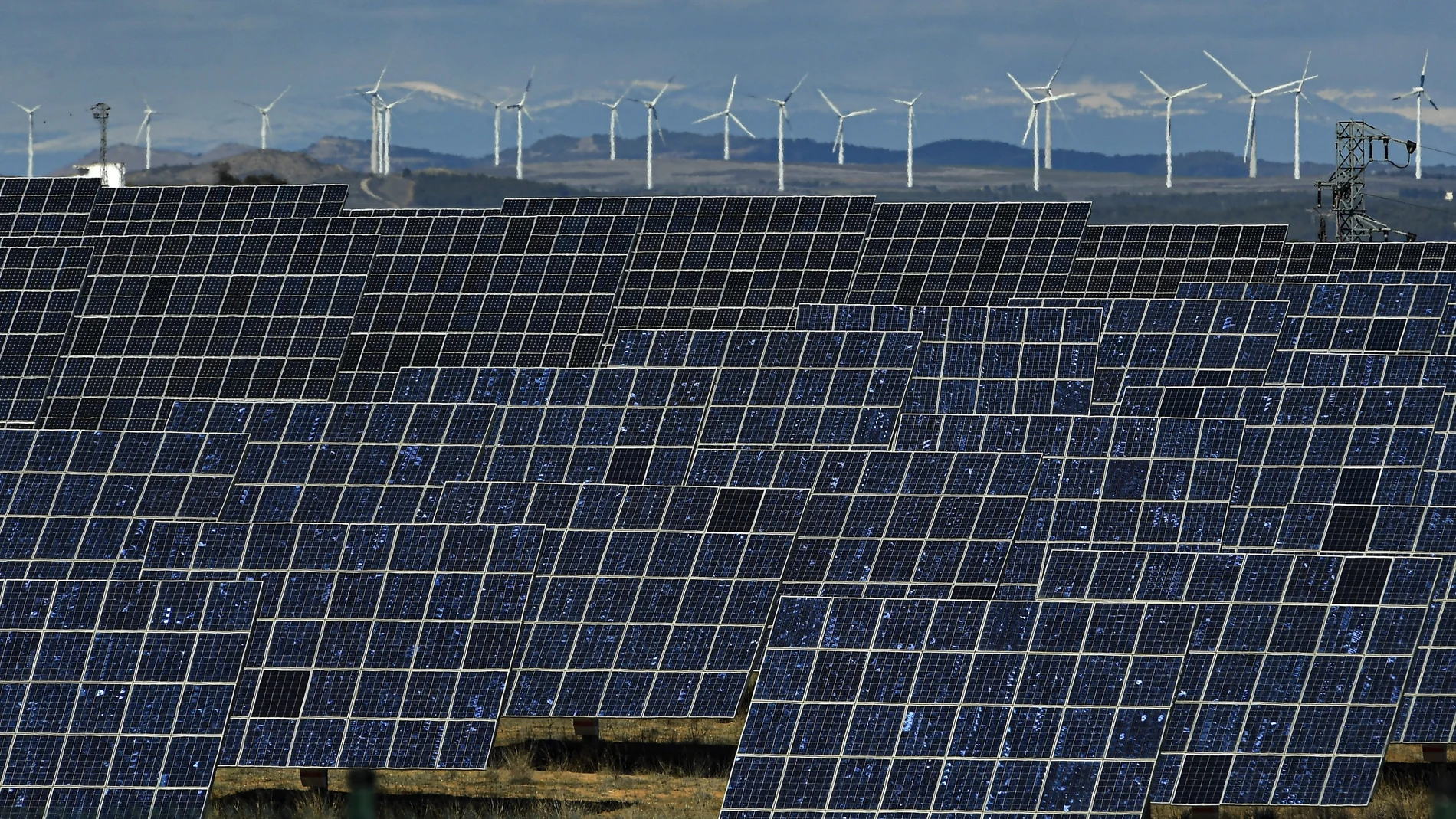 Solar panels work near the small town of Milagro, Navarra Province, northern Spain. Renewable energy investors who lost subsidies promised by Spain are heading to a London court to try to claw back $125 million from the government ó a decadelong dispute with ramifications for clean energy financing across the European Union.
