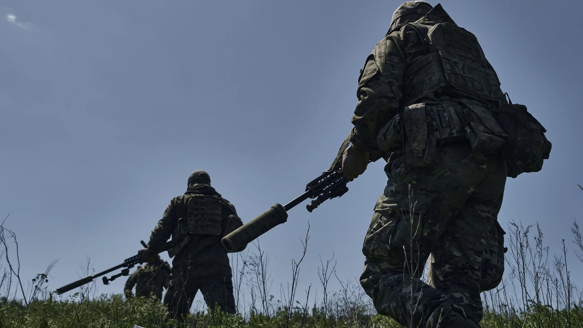 Ukrainian army snipers change their position facing Russian troops near Bakhmut, Donetsk region, Ukraine, Tuesday, May 2, 2023.
