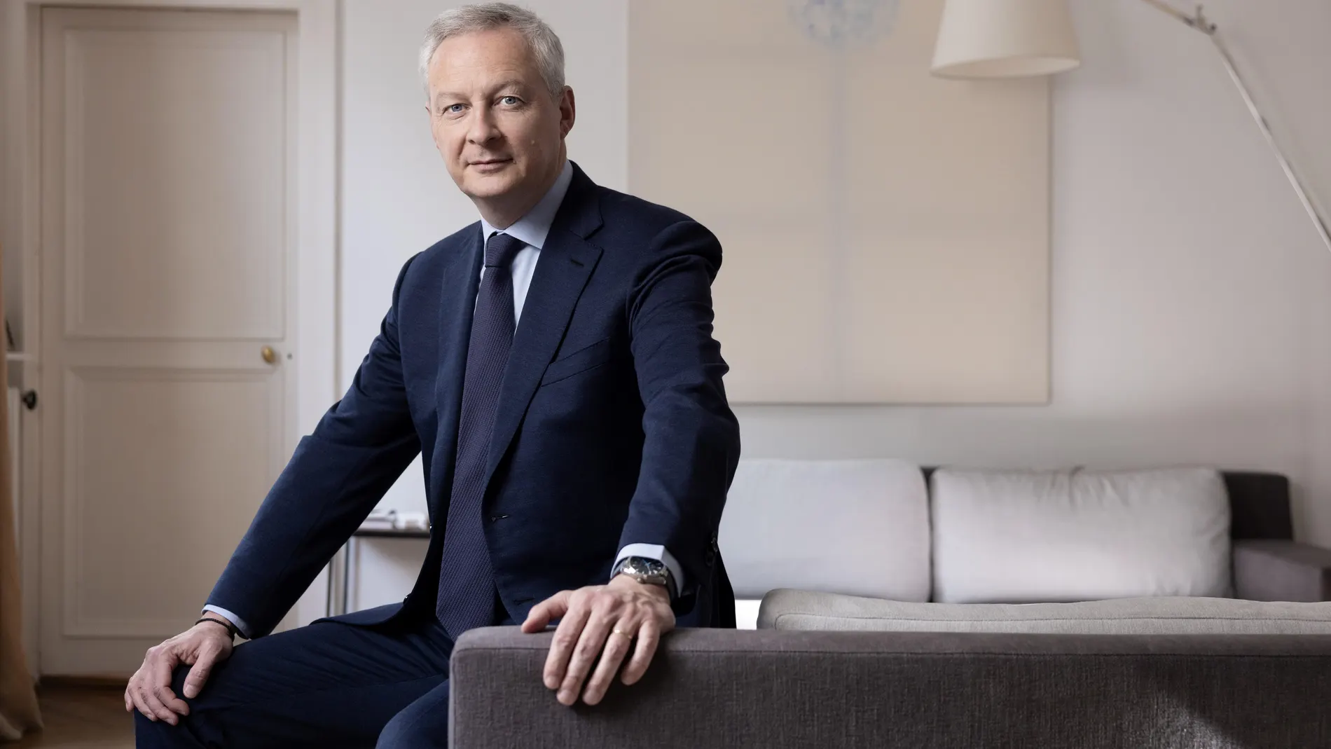 French Minister for the Economy and Finances Bruno Le Maire poses during a photo session at his home in Paris on April 27, 2023.
