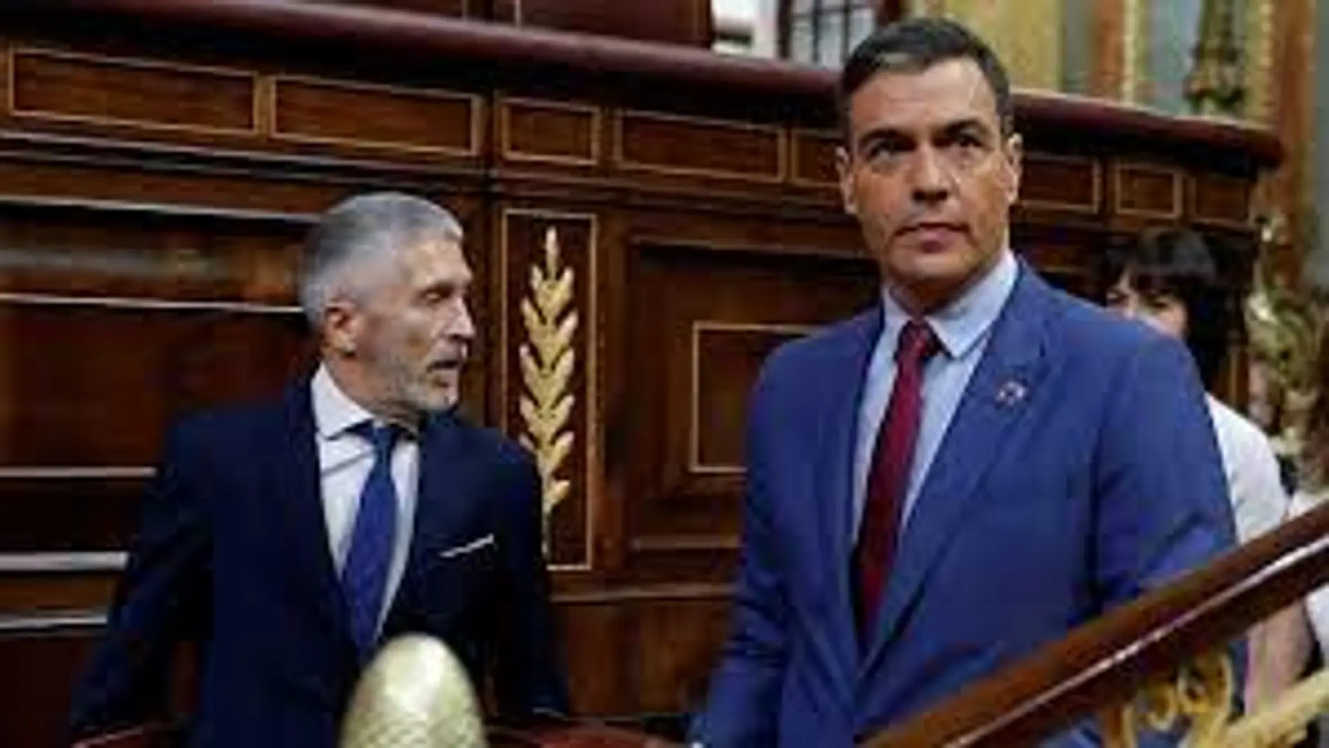 Fernando Grande-Marlaska y Pedro Sánchez