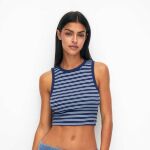  Los tops más icónicos y versátiles son los ‘tank tops’ y sabemos que te los llevarás en tu maleta de vacaciones